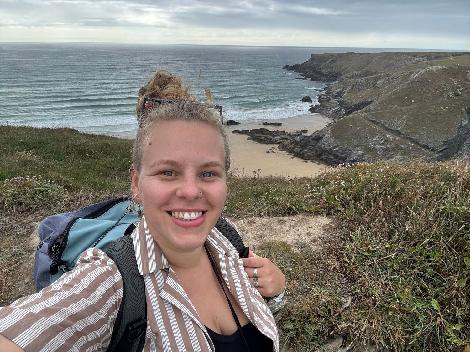 women smiling on south west coastal path in cornwall
