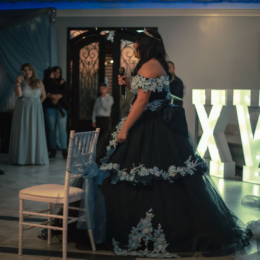 Quinceanera giving her thank you speech to her attending party