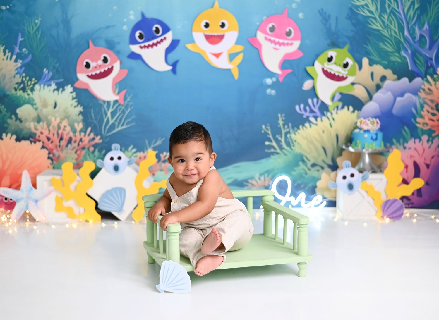 A colorful underwater-themed photo collage featuring Baby Shark characters and decorative elements.