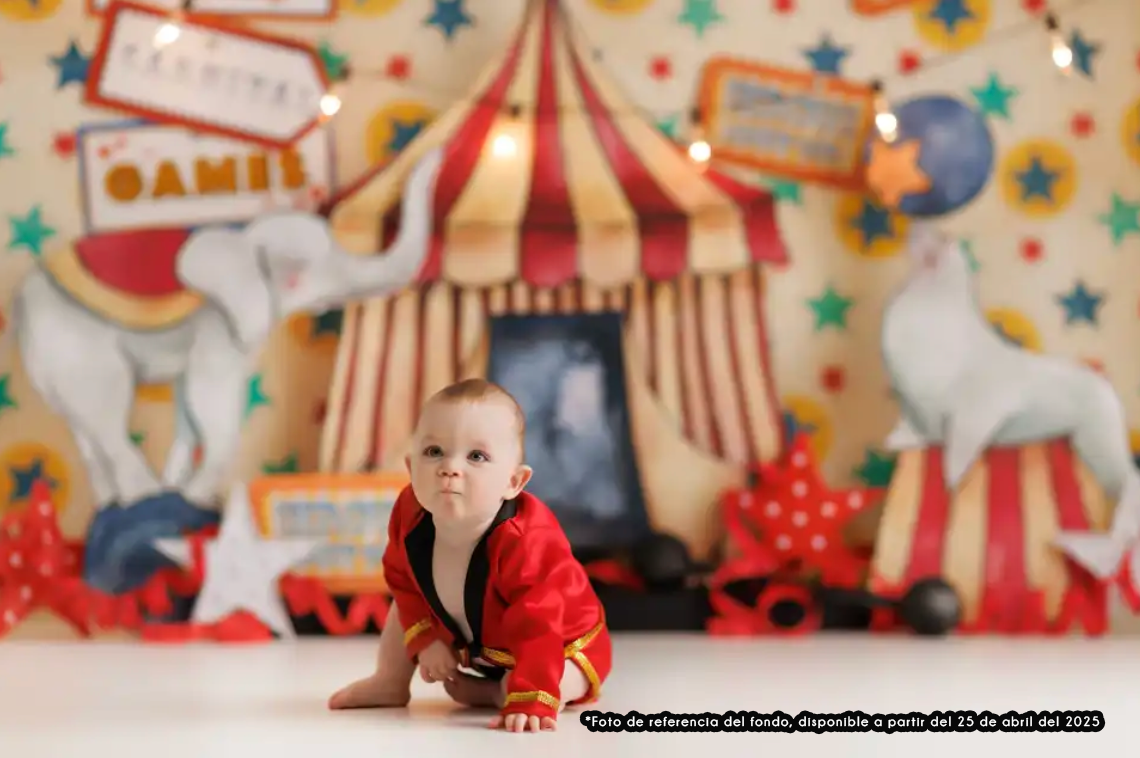 Circus-themed birthday photo setup with red and white tent, elephants and colorful stars in the background.