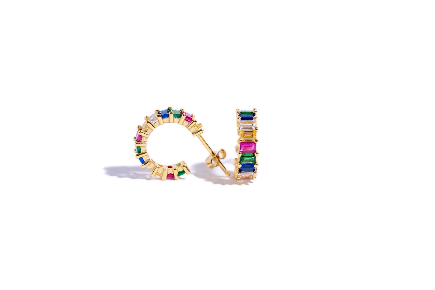 A close-up of luxury jewellery, multi-coloured stone gold hoop earrings - Product Photography