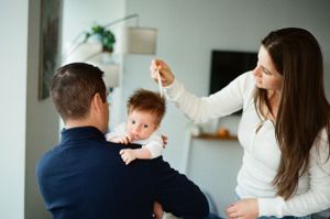 in-home newborn film photoshoot in SF Bay Area with natural light, intimate connection and cinematic film tones
