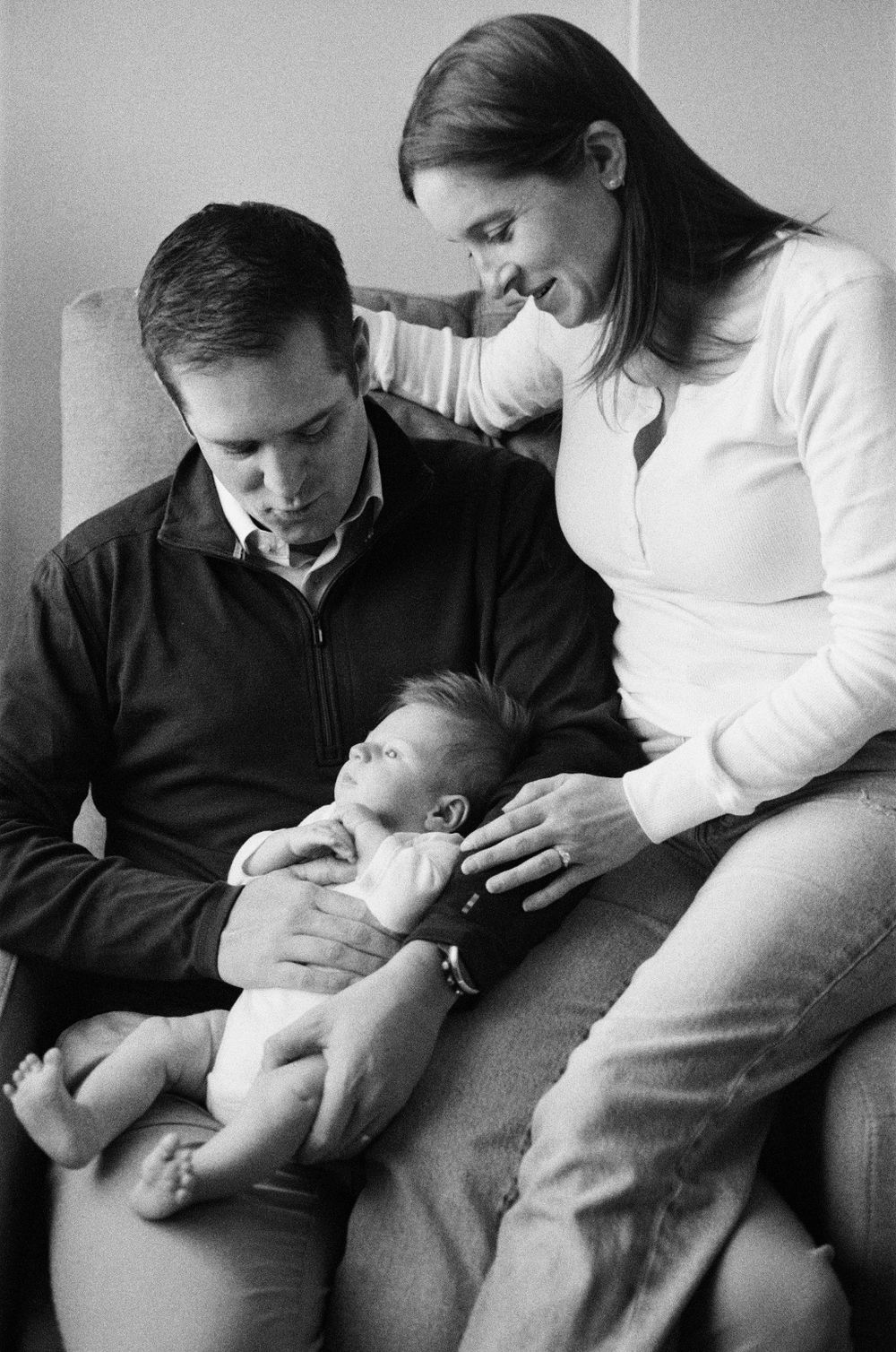in-home newborn film photoshoot in NYC with natural light, intimate connection and cinematic film tones