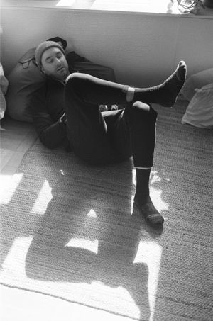 intimate and candid portrait photographer capturing movement and connection in a documentary style