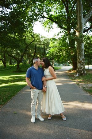 Central Park engagement photography in New York City featuring a romantic couple photographed on 35mm film