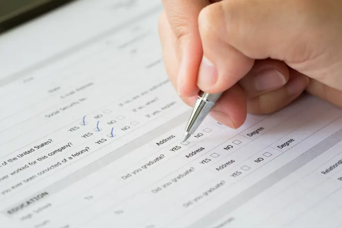 Filling out a contact and questionnaire form.