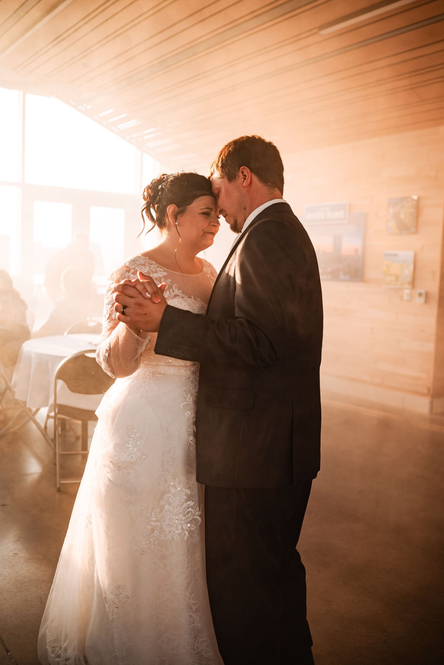 Romantic dance photos with warm lighting creating a dreamy atmosphere.