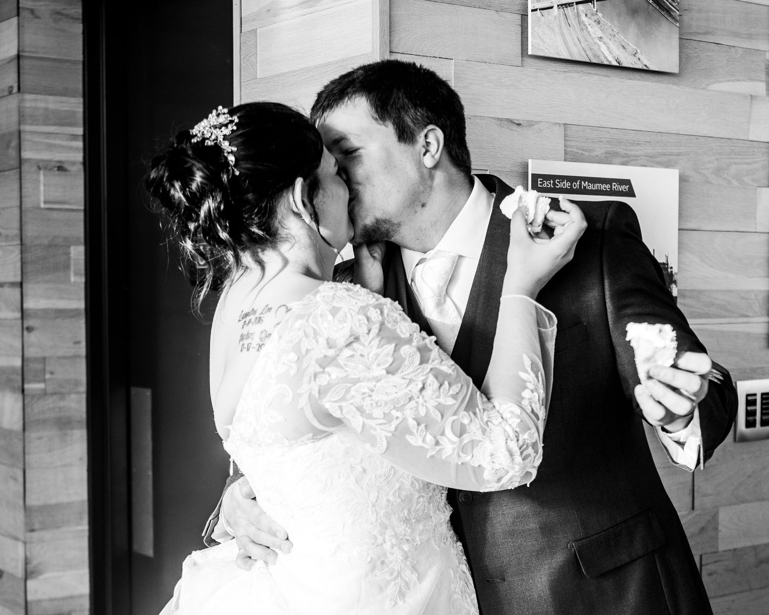 Black and white romantic dance sequence in an intimate indoor setting.