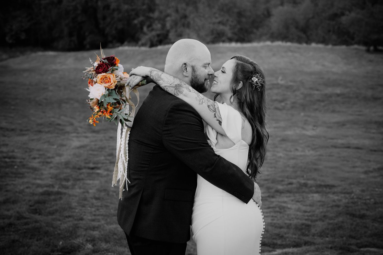 Black and white wedding photos show a couple dancing and embracing in an outdoor setting with flowers.