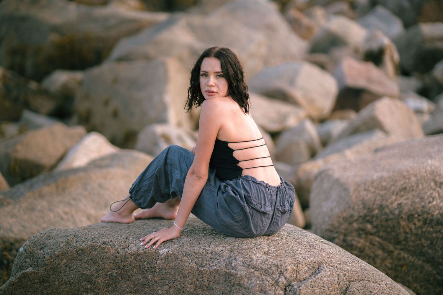 Portrait along the rocky side of the beach.