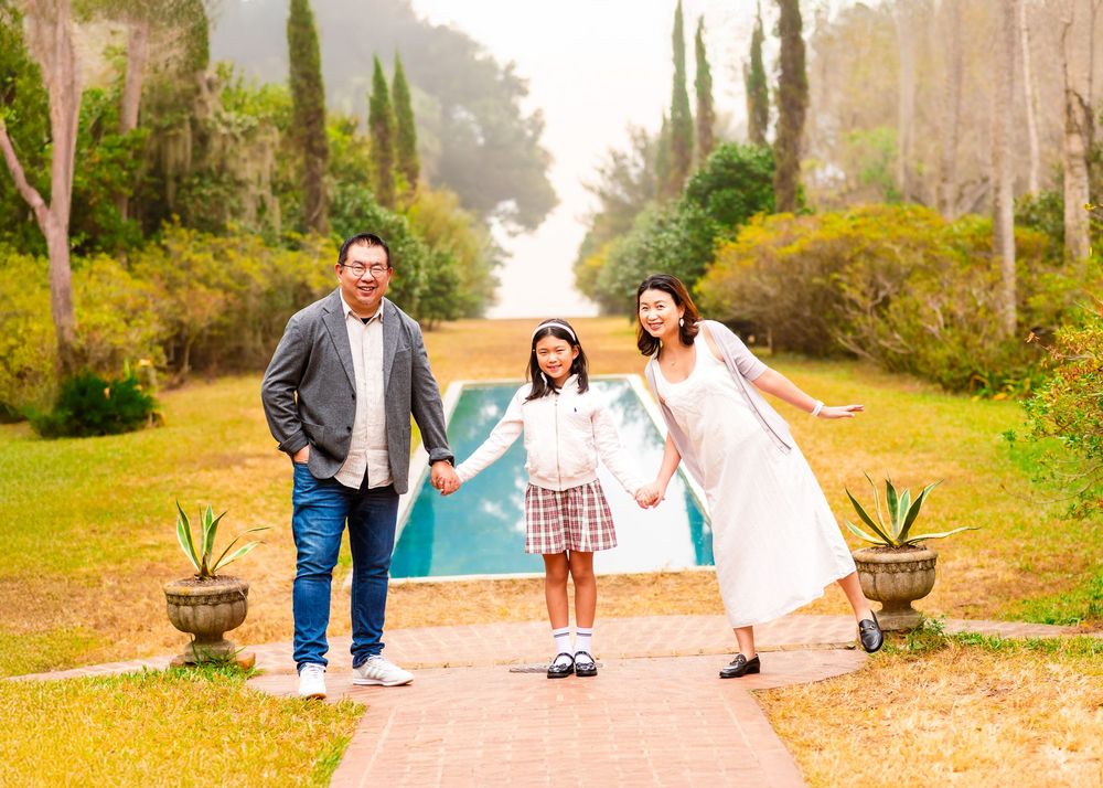 A series of outdoor engagement photos taken on a tree-lined path during golden hour lighting.