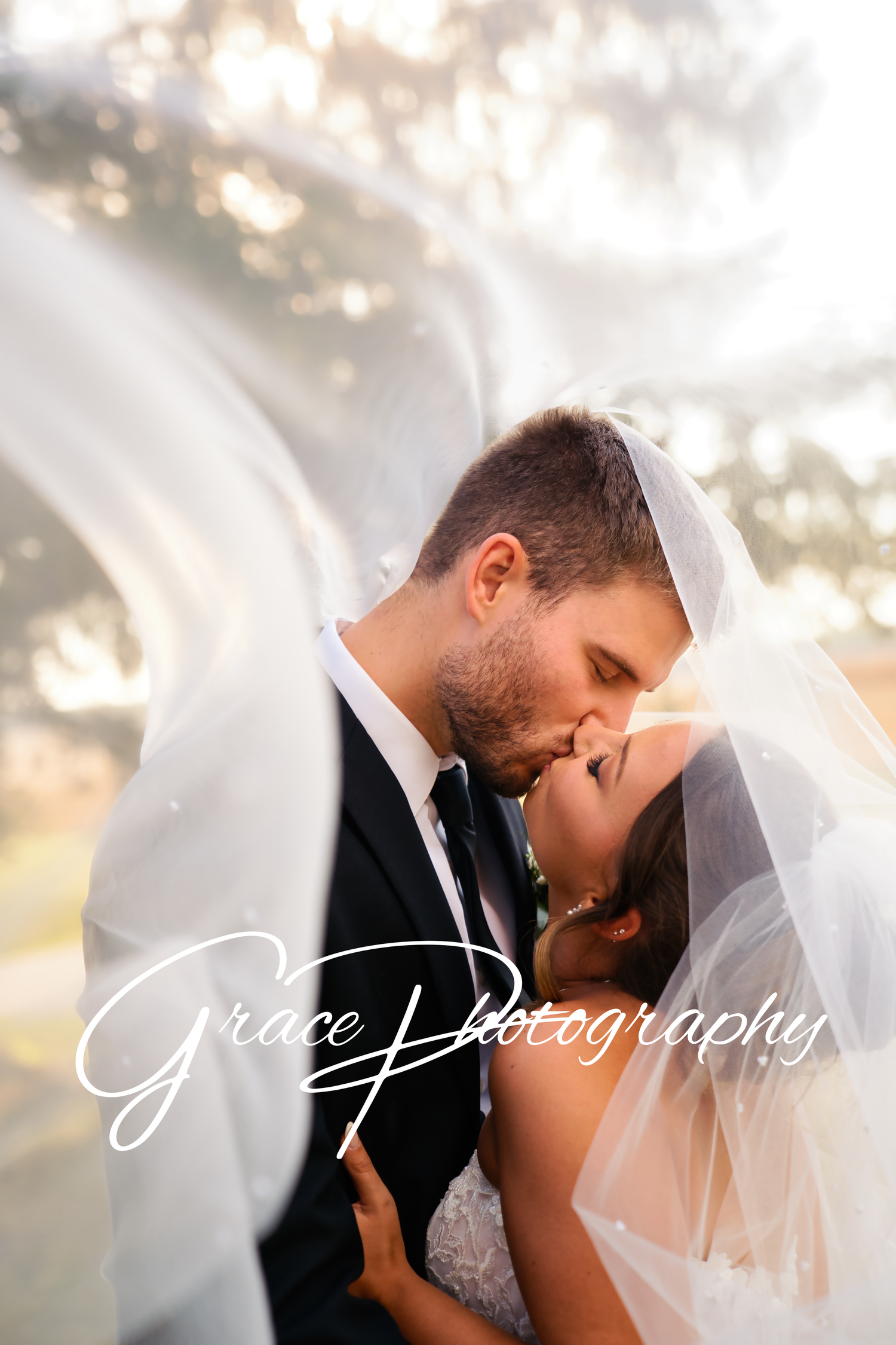Bride and Groom kissing at sunset during golden hour in Yellow Springs Ohio wedding venue : Cincinnati Wedding Photographer