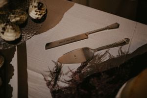 A sequence of still shots showing a wooden aircraft model being hand built with wooden sticks and glue on a desk.