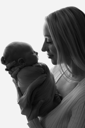 profile picture of mom holding newborn baby