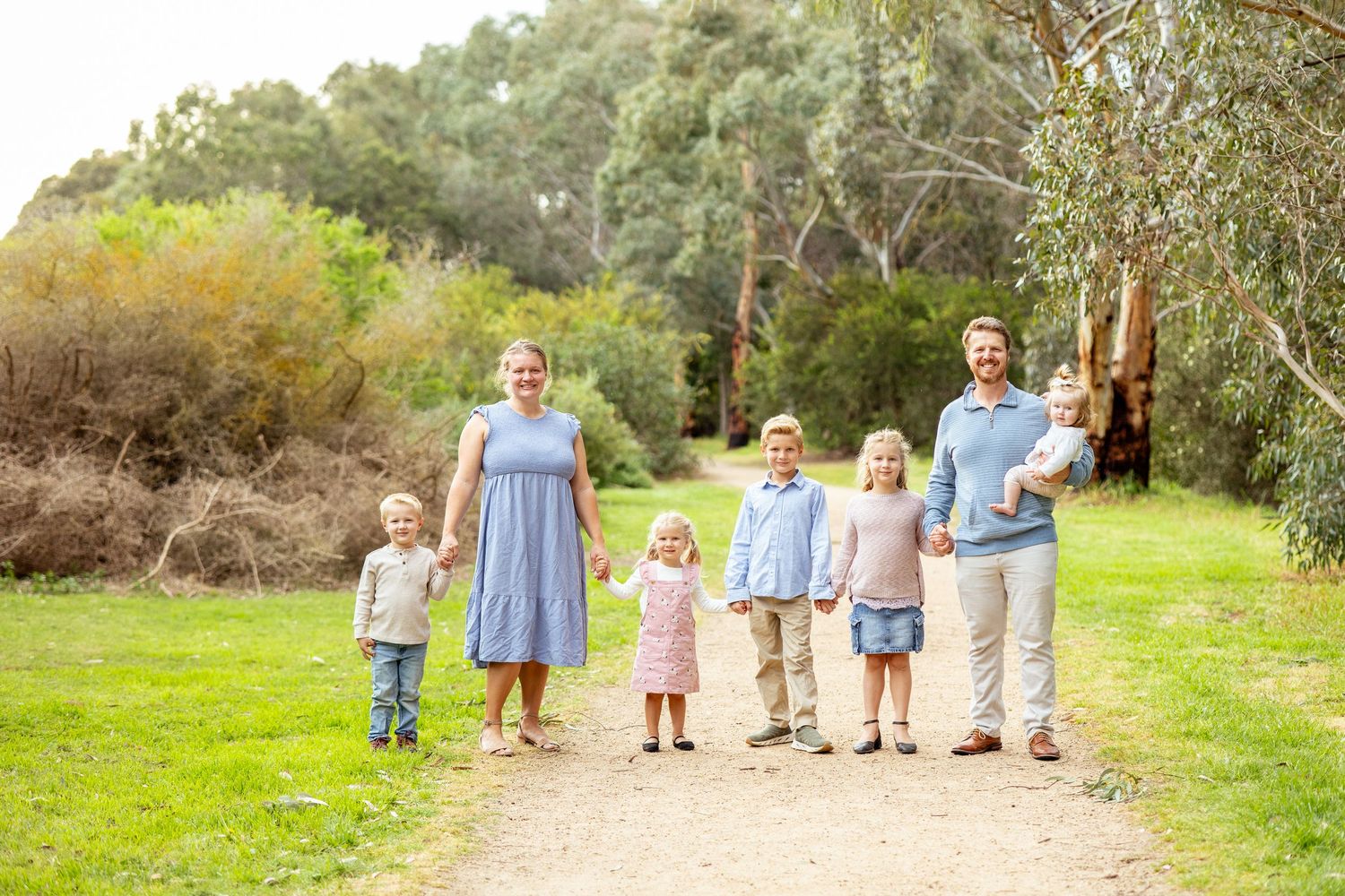 Big family excited and happy in Melbourne photoshoot, joyful moment.