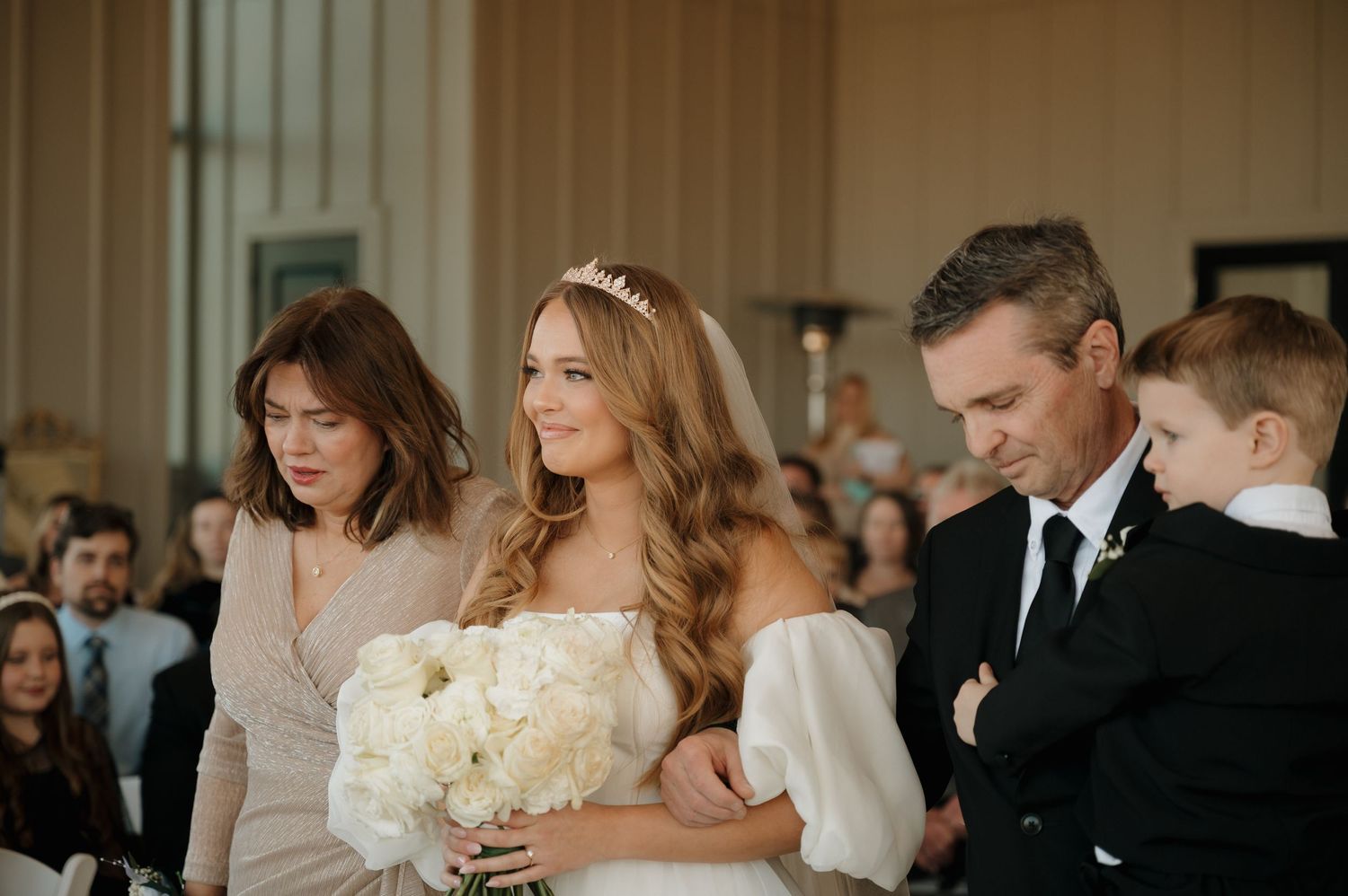 Elegant wedding ceremony scene with white floral bouquet in a classic indoor setting at Fields at Skycrest. North Carolina wedding venue