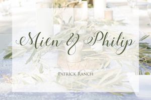 Elegant wedding invitation with calligraphy text and floral design for a Patrick Ranch celebration.