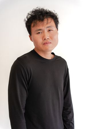 Three photos of a person wearing a black long sleeve shirt against a white background.
