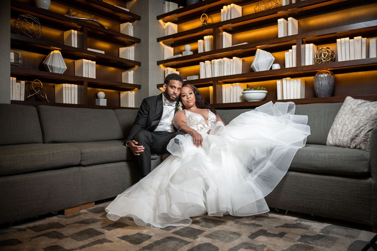 Bride and groom take a moment together in the library at the venue in Cincinnati, Ohio captured by Florida destination wedding photographers