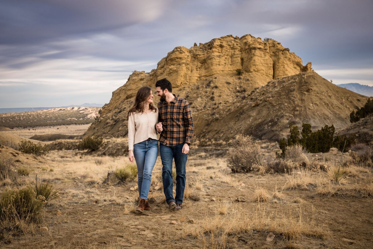 Beautiful outdoor engagement photography; engaged couple in New Mexico landscape; Clarissa Anello