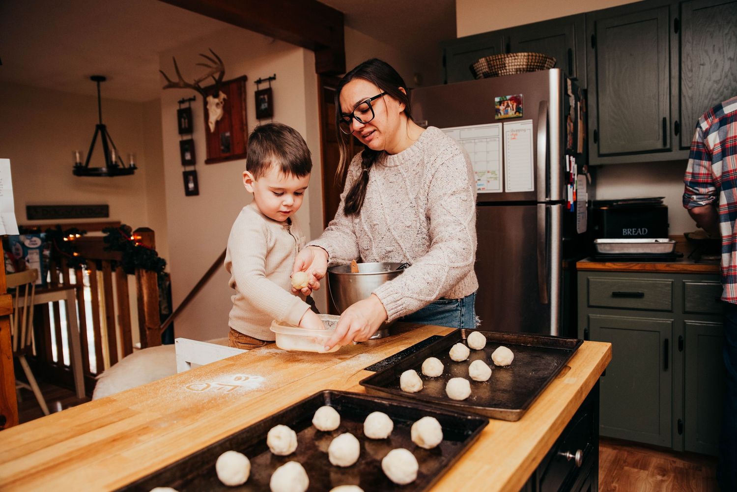 Mom and son making Christmas cookies in New Gloucester Maine.