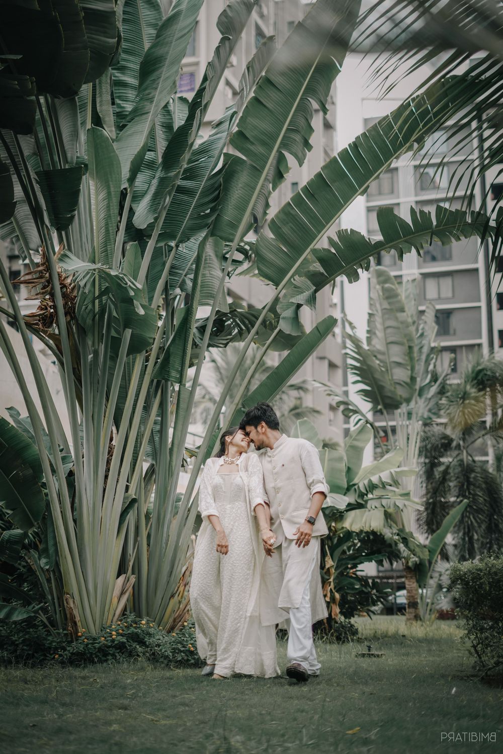 Wedding photography sequence showing couple amid towering banana trees in white attire.