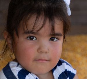 A close up portrait in natural lighting showing expressions and details.