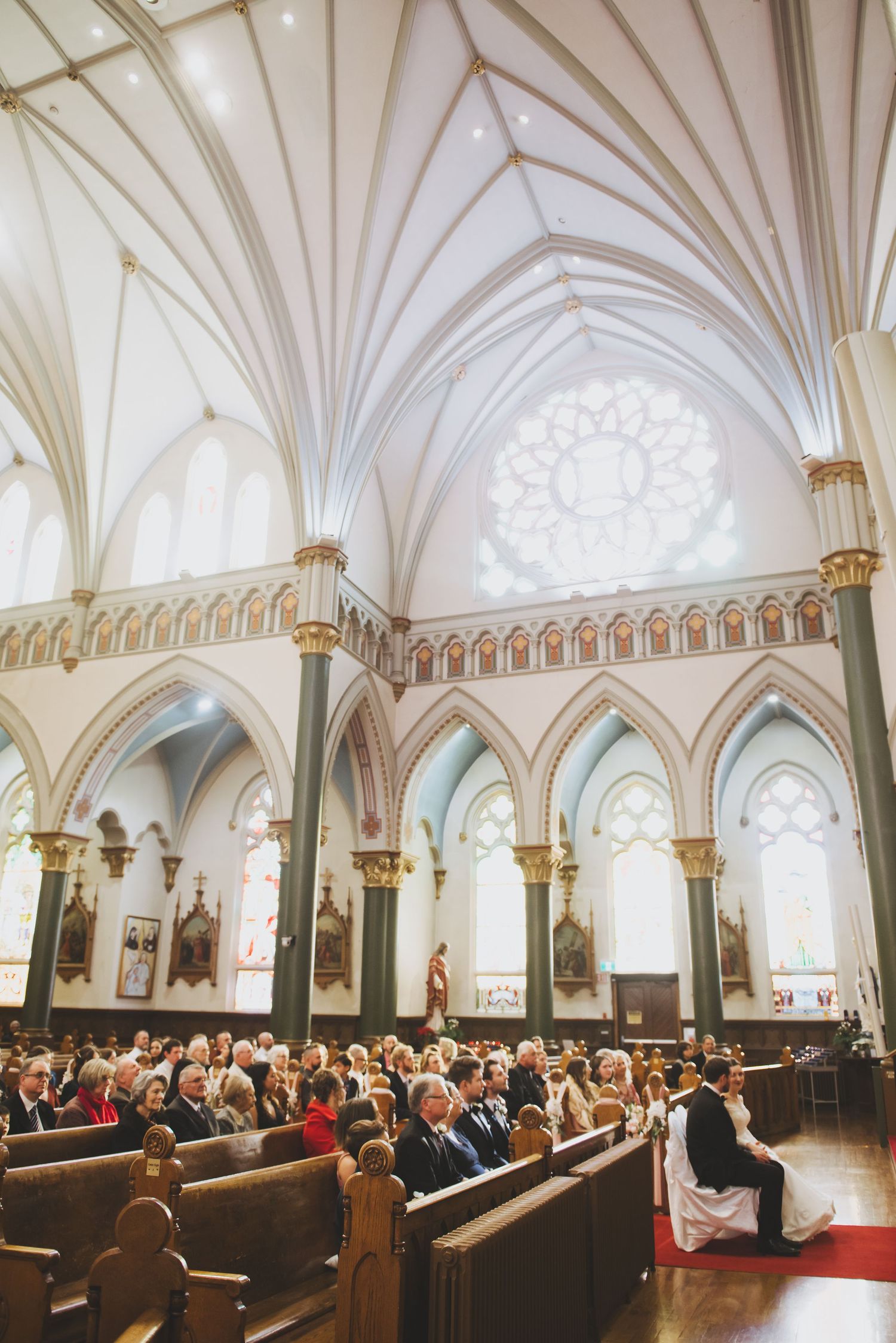 parishioners sitting in the pews at st andrew's cathedral in victoria british columbia
