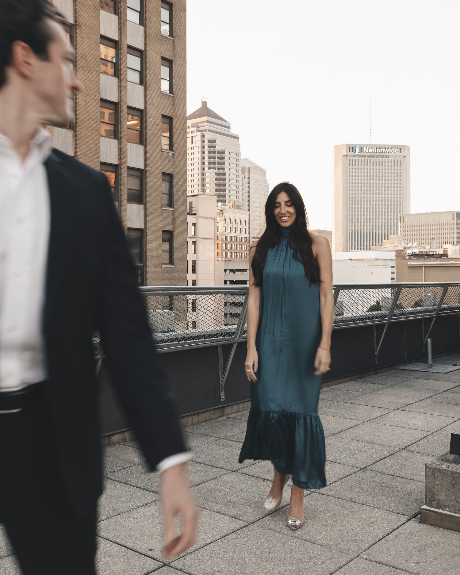 Chic rooftop moments in Columbus, Ohio - timeless style, candid love, and urban vibes captured beautifully during this elegant engagement.