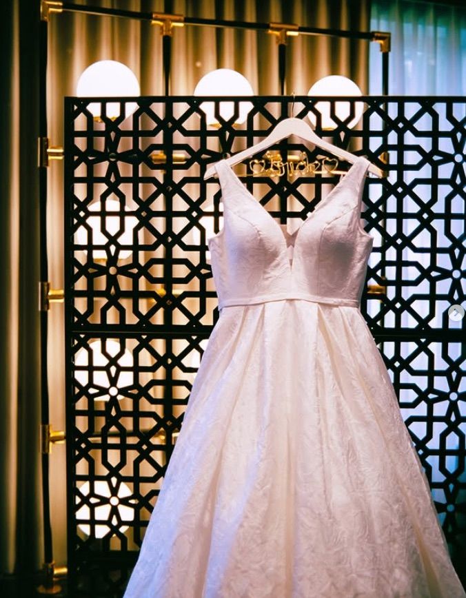 Wedding dress shown off on 35mm vintage film wedding photography in pittsburgh pa.