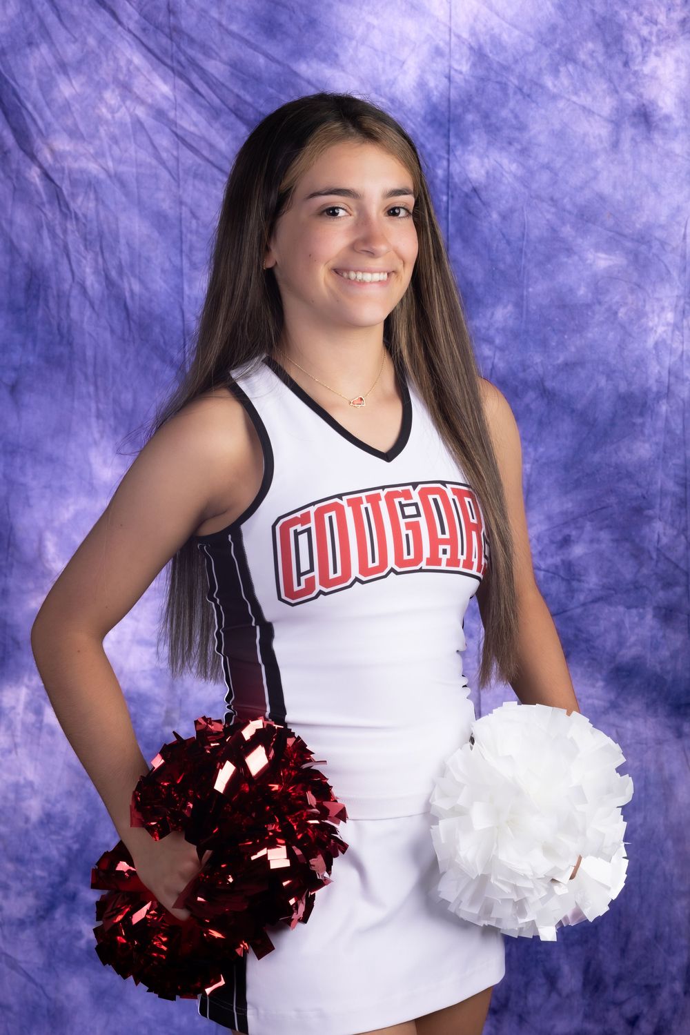 A smiling cheerleader in a white Cougars uniform holds red and white pom-poms against a purple backdrop.