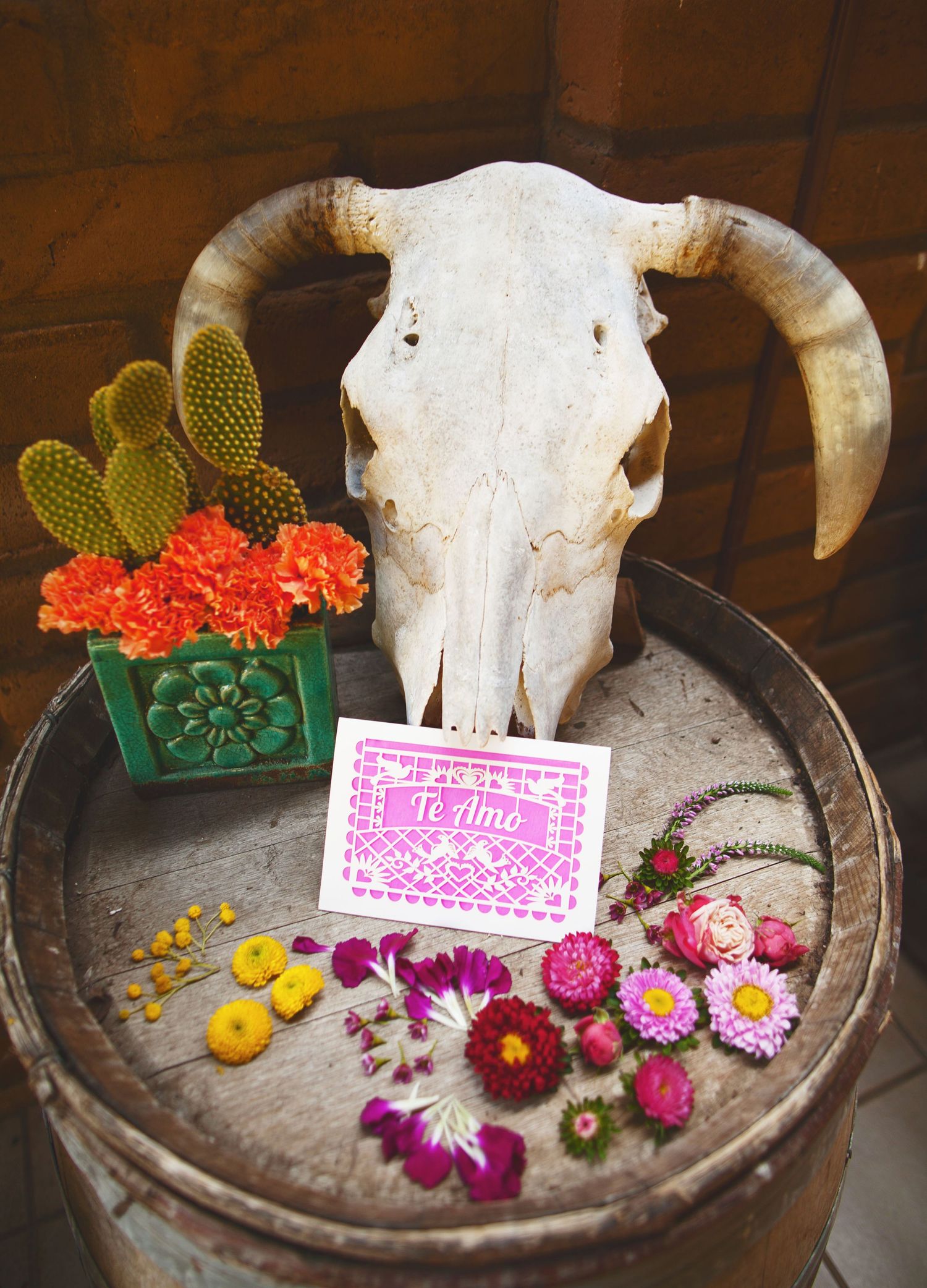 wedding day details of an invitation in a south west theme