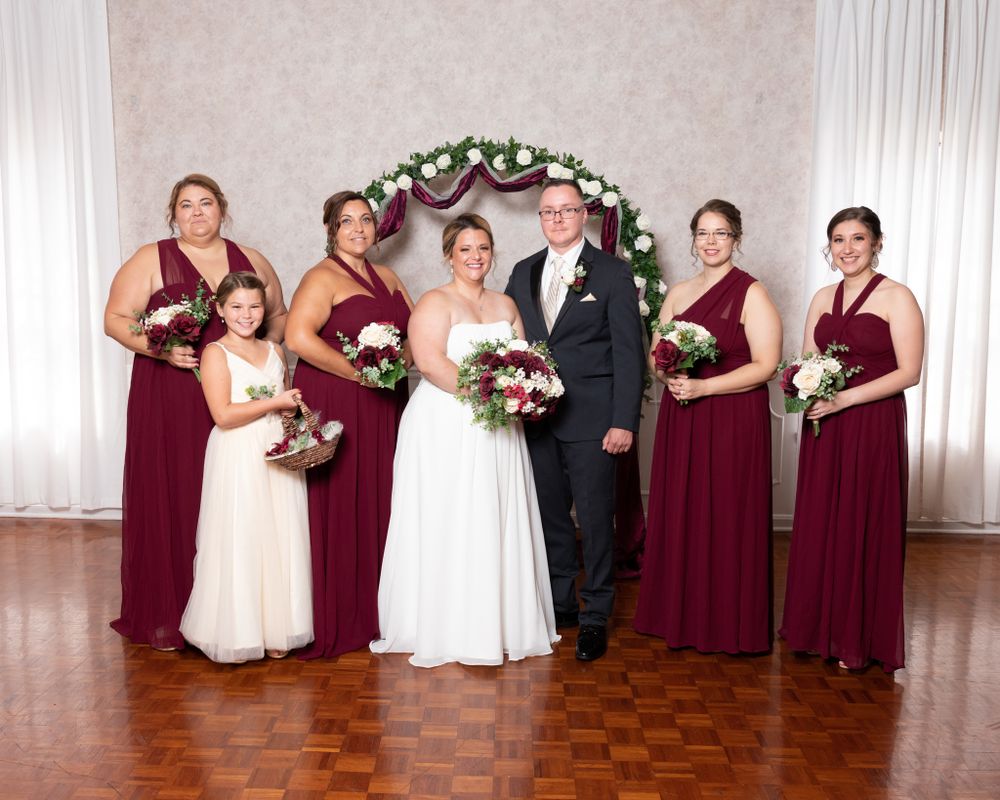 Groom with bridesmaids
