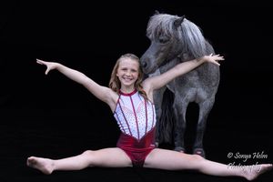 Dramatic split leap poses against a black background showcasing athletic dance movements.