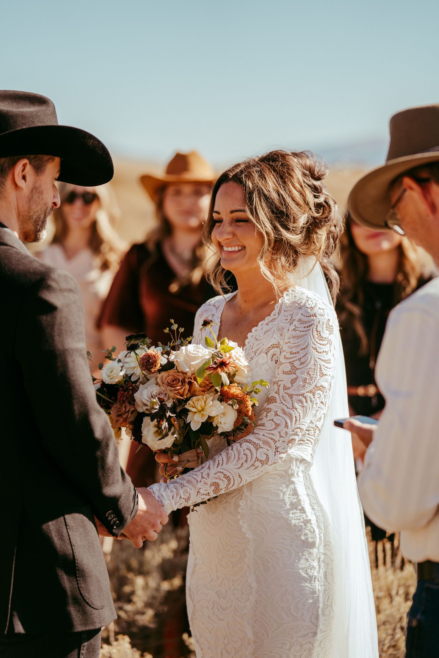 Golden hour sunlight creates a warm glow over the scenic mountain backdrop