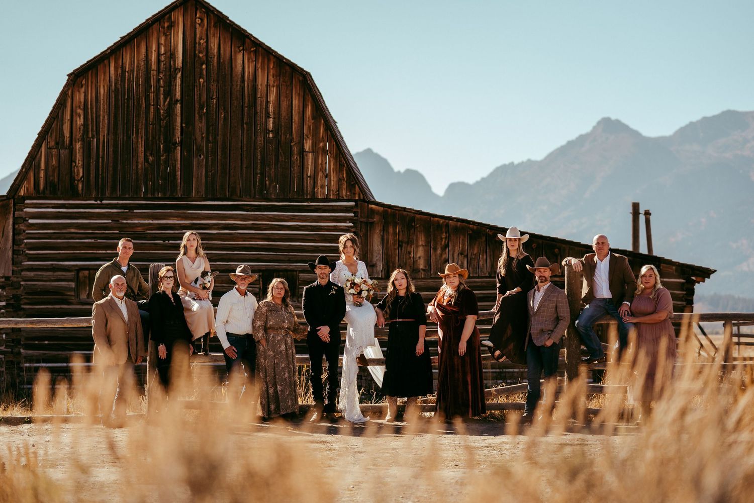 Golden hour sunlight creates a warm glow over the scenic mountain backdrop
