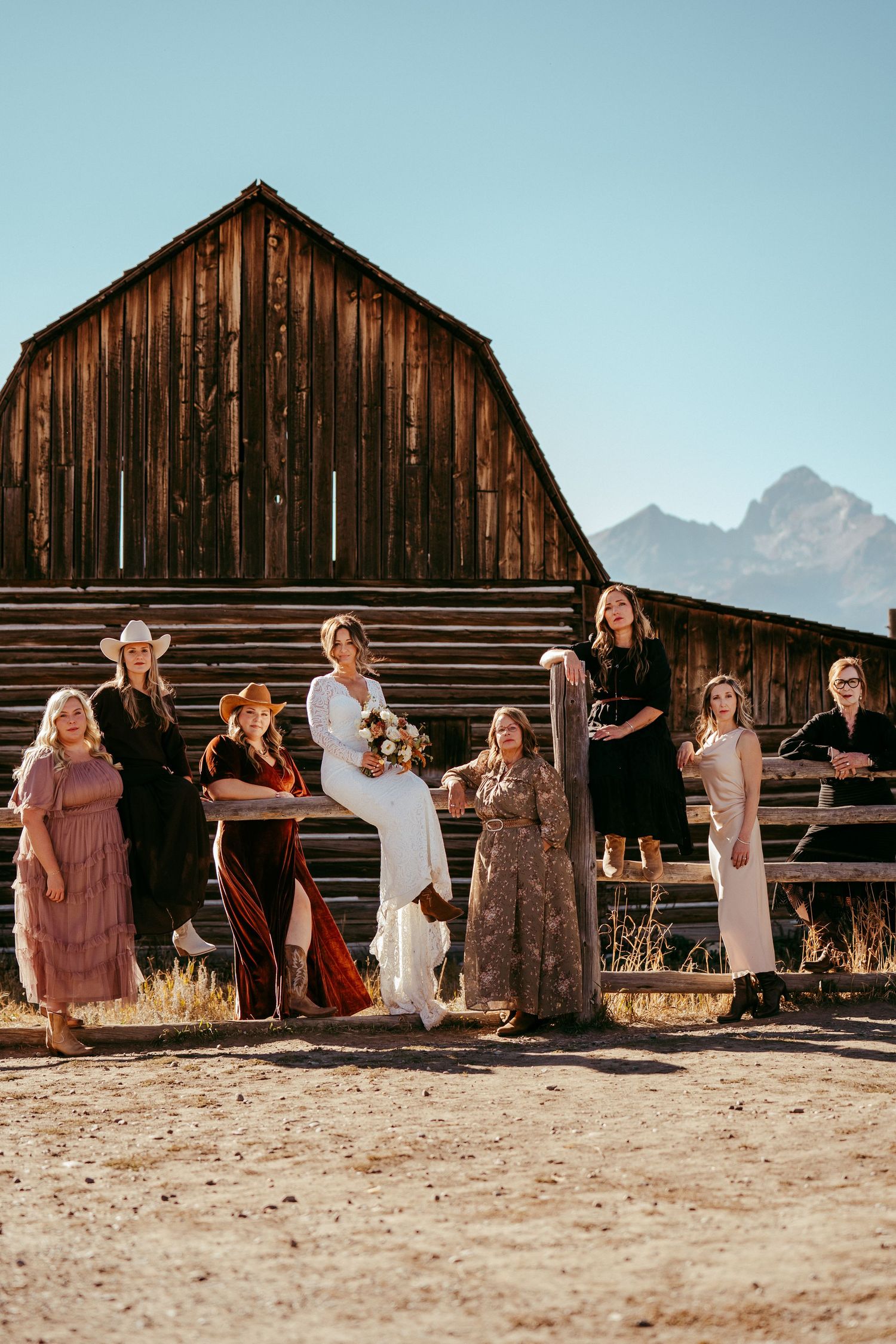 Golden hour sunlight creates a warm glow over the scenic mountain backdrop