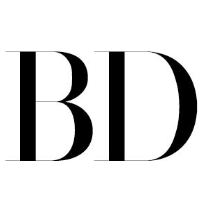 Black serif typography showing the letters BD in an elegant editorial style.