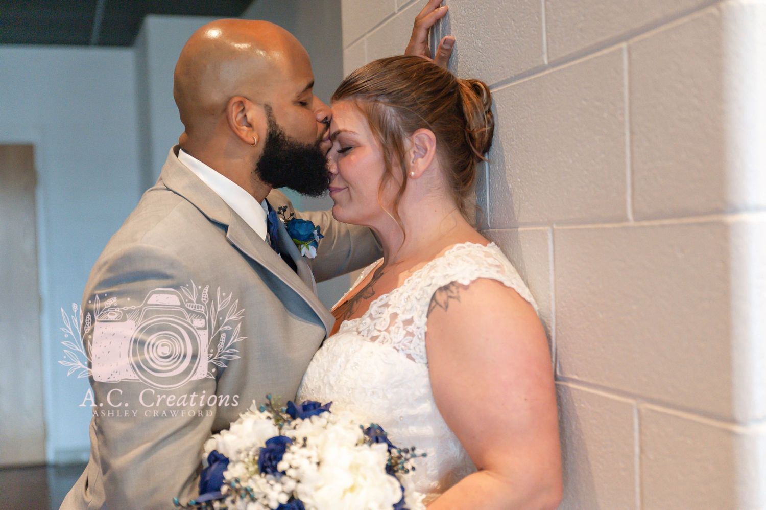 An intimate moment between newlyweds as they share a tender embrace.
