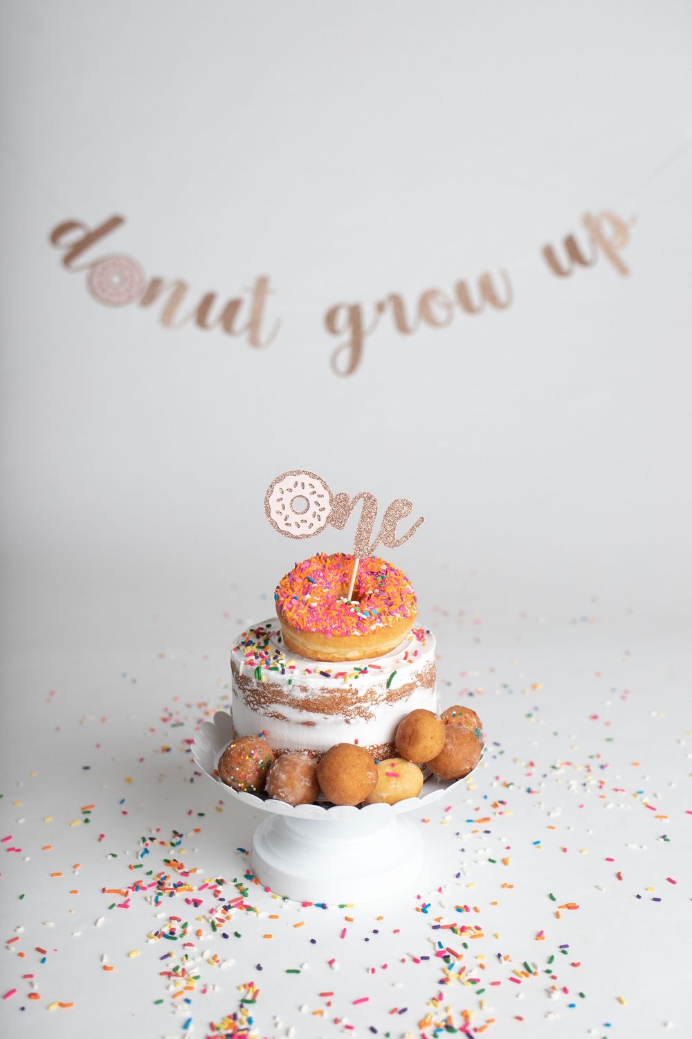 Cake smash session with donuts theme, taken by Jen Knightstep, Photographer