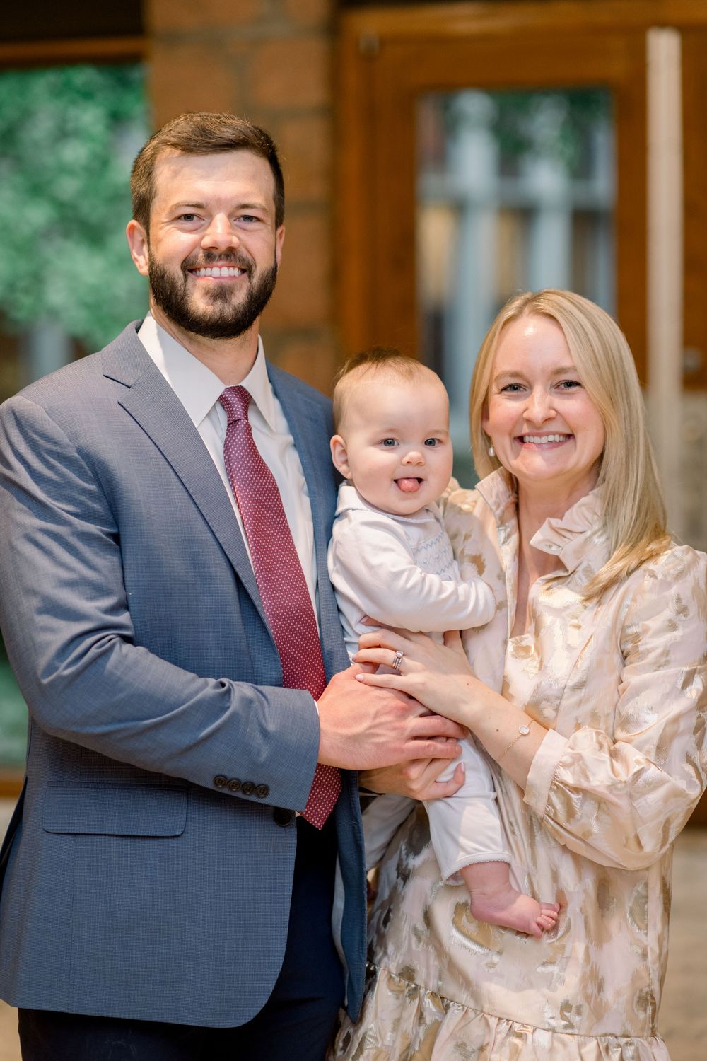A family portrait series showing joyful moments between parents and their baby in outdoor setting.