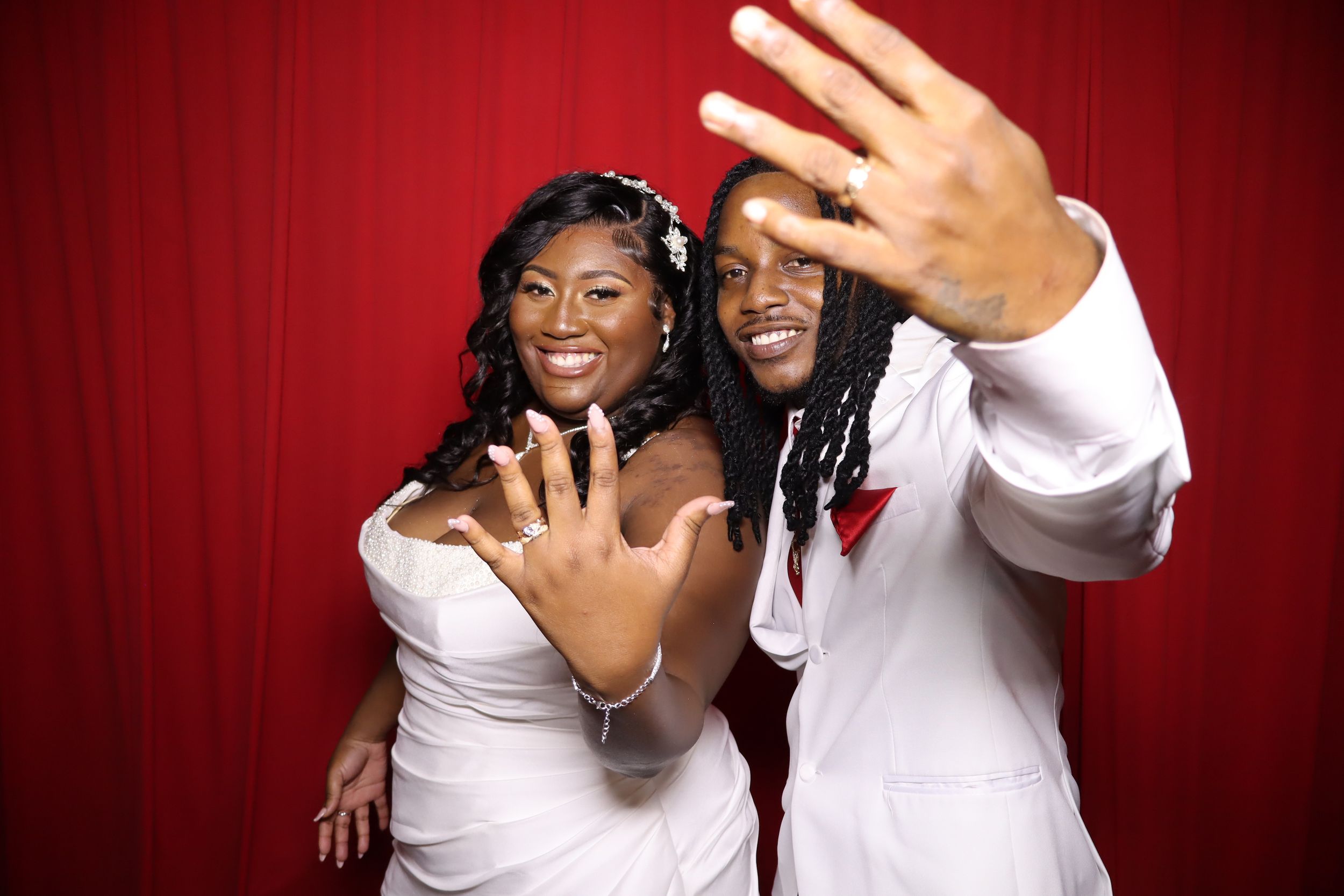 One of our wedding couples having fun at our photo booth. They were excited to have our photo booth for their guest to enjoy.