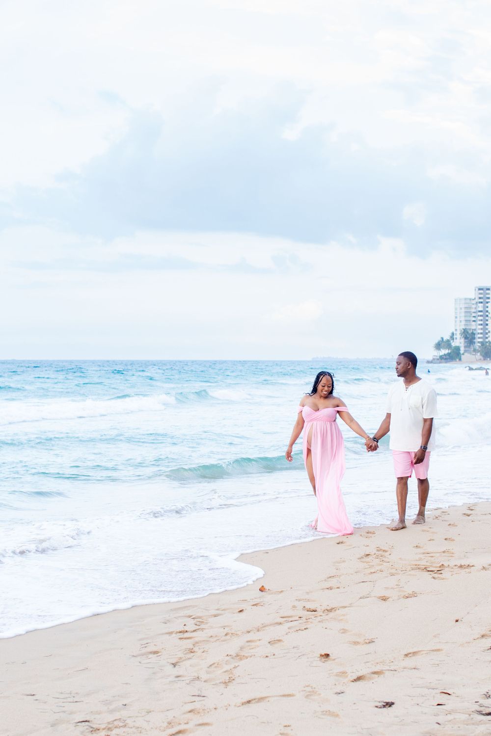 Couples maternity portrait on the beach. San Juan, Puerto Rico.
