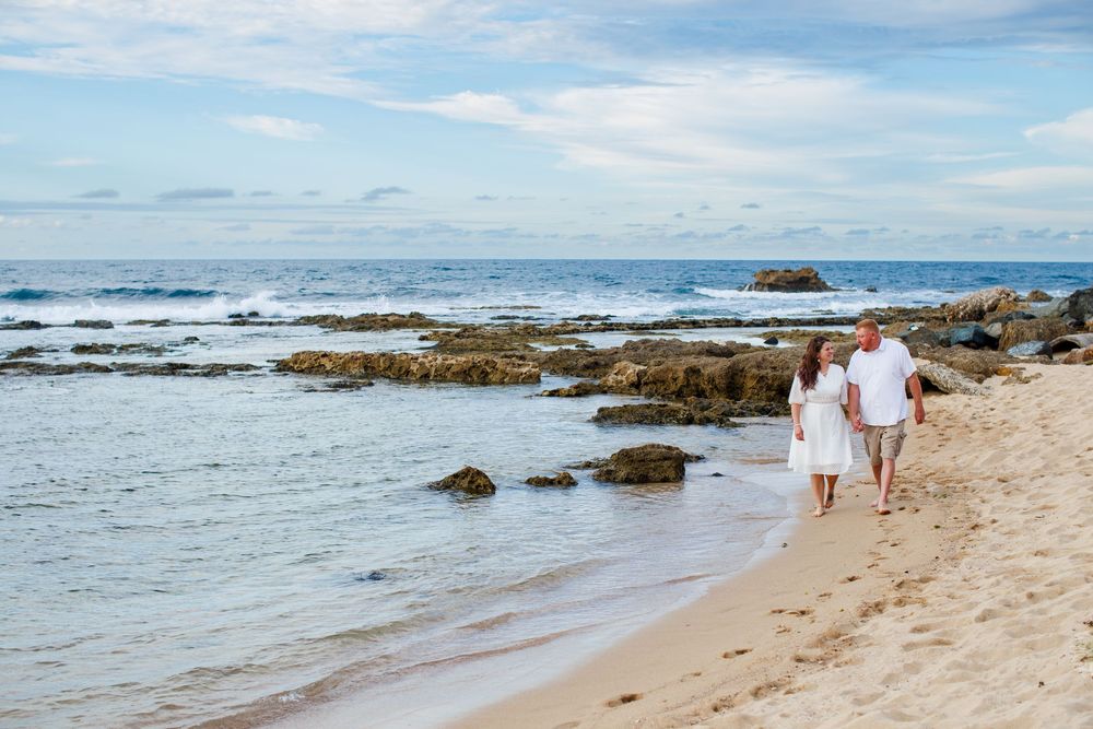 Couples portrait on the beach. Balneario del Escambrón. Old San Juan, Puerto Rico.