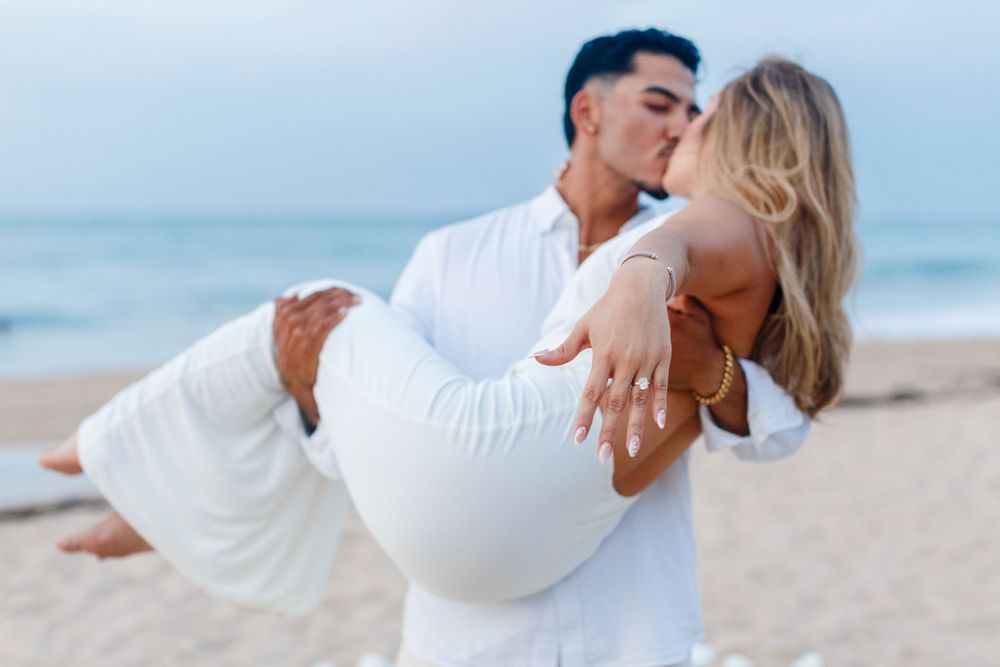 Couples portrait. Marriage proposal on the beach. San Juan, Puerto Rico.