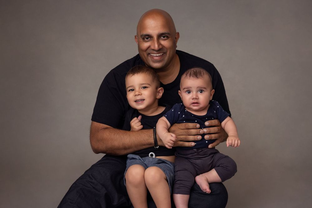 Beautiful family photography of Dad and two baby boys, capturing treasured memories for generations