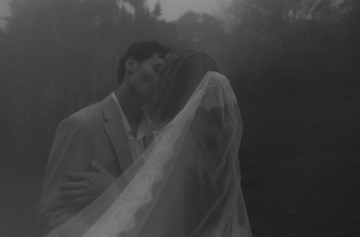 Bride and groom sharing a romantic moment during bridal portraits on Kauai.