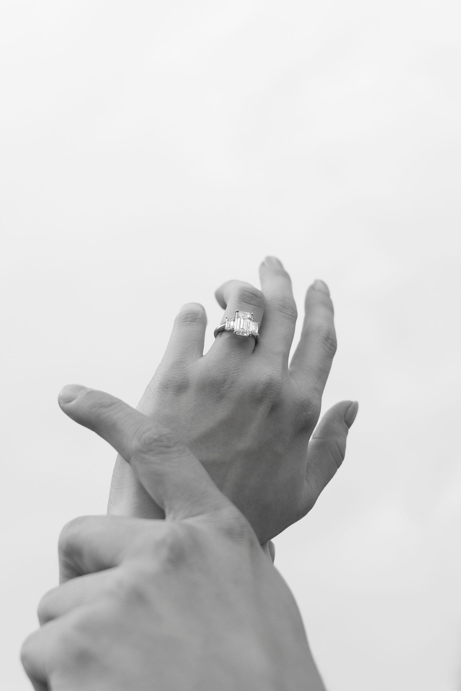 editorial engagement shoot of couple's engagement ring captured in black and white in the historic district of Jekyll Island near Cherokee