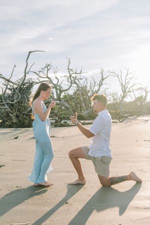 Coastal engagement on Jekyll Island's best beach during a surprise proposal with photographer Lindy Rebro