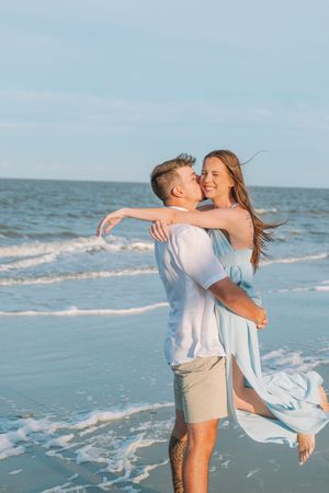 Editorial engagement session portraits with award winning photographer of Georgia, couple's photographed late afternoon on beach jekyll is